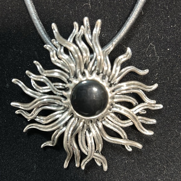 Silvertone sunburst necklace and earring set. Leather strap. - Picture 1 of 9